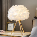 Feder-Tischlampe mit Goldakzenten – elegante Deko-Leuchte