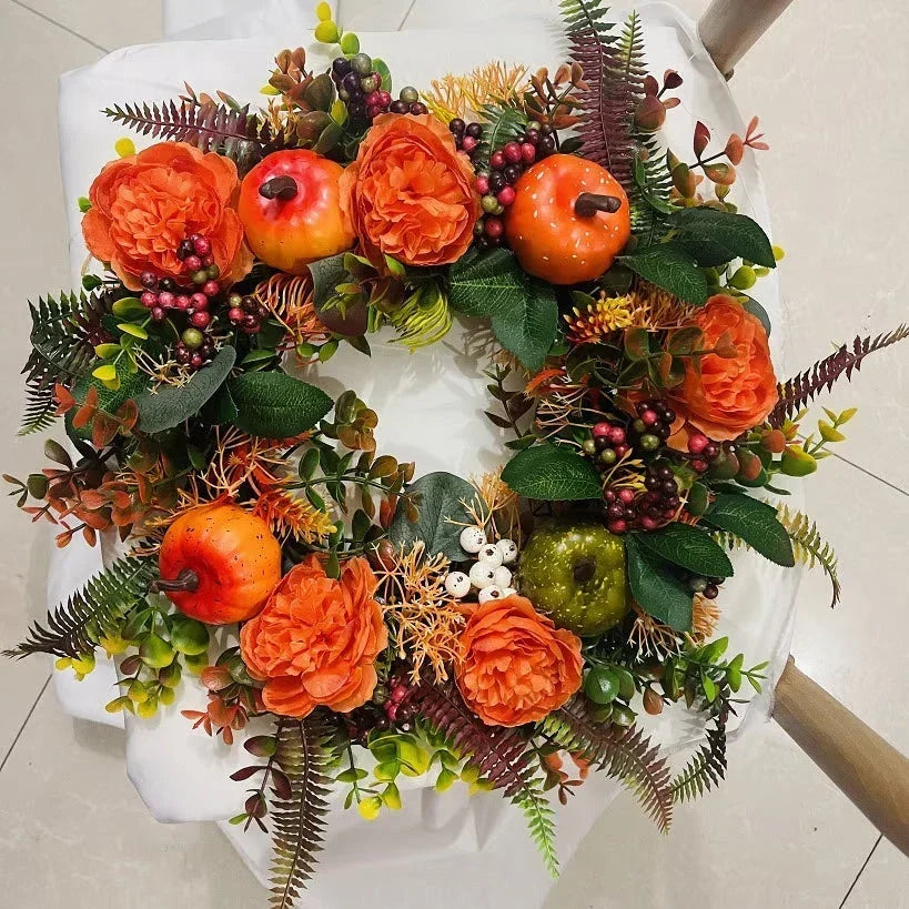 Herbstkranz mit Pfingstrosen und Kürbis für Tür und Wand