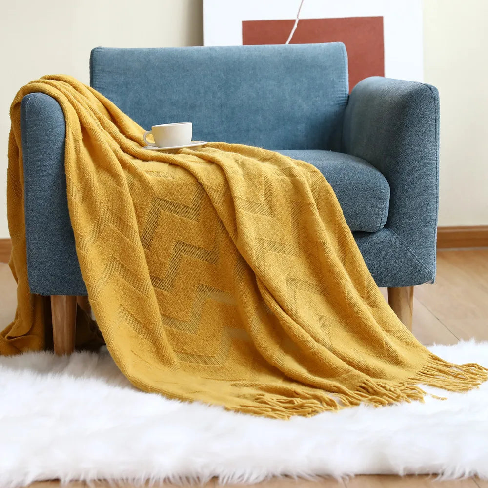 Jacquard-Strickdecke mit Fischgrätenmuster – weich und dekorativ