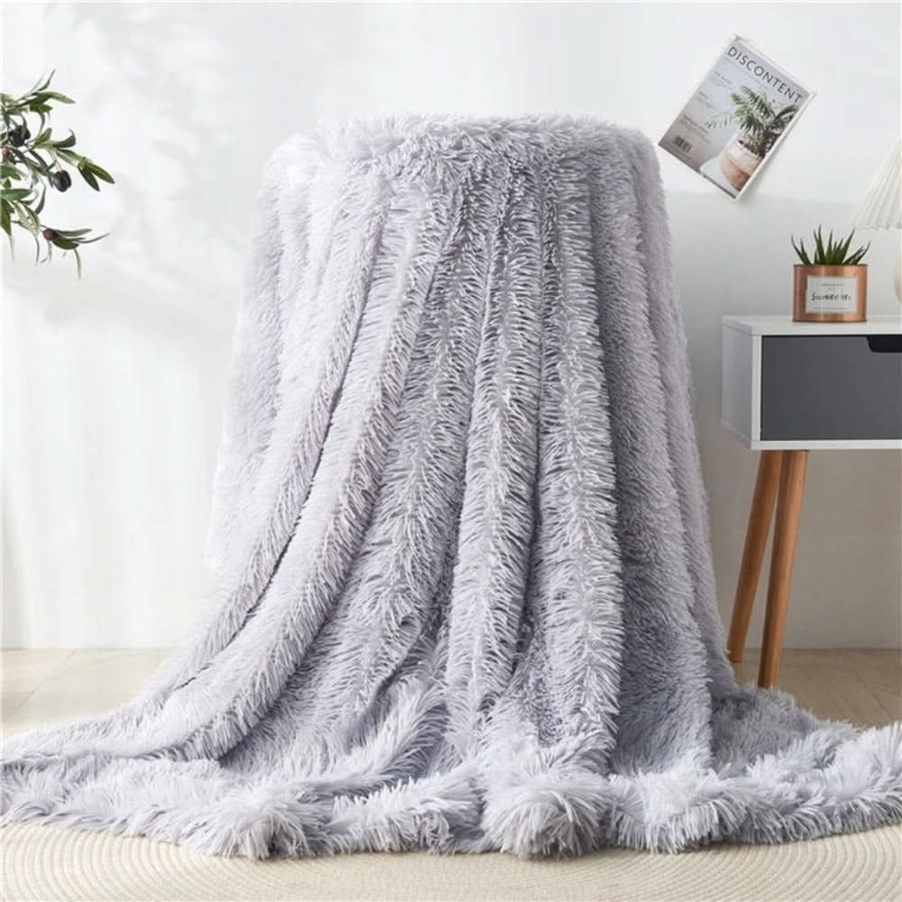 Kunstfell Kuscheldecke – flauschig weich für das ganze Jahr